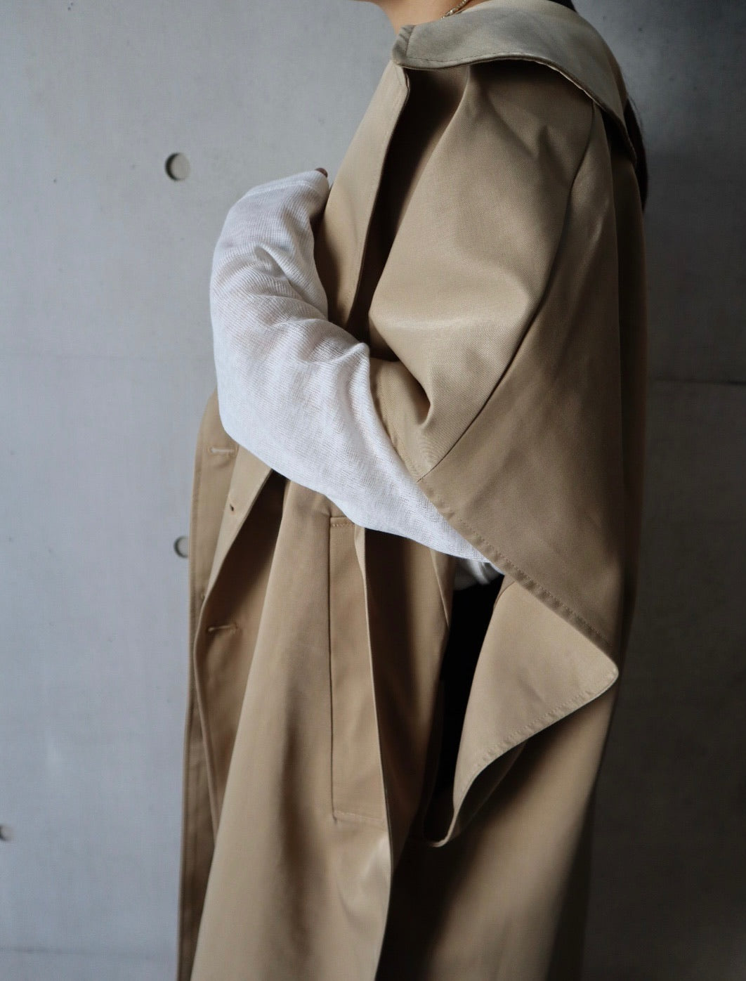 cape like trench coat