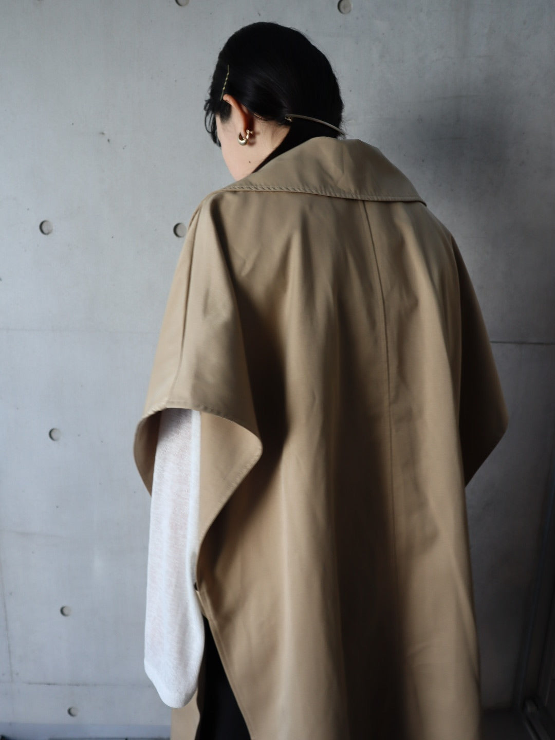 cape like trench coat