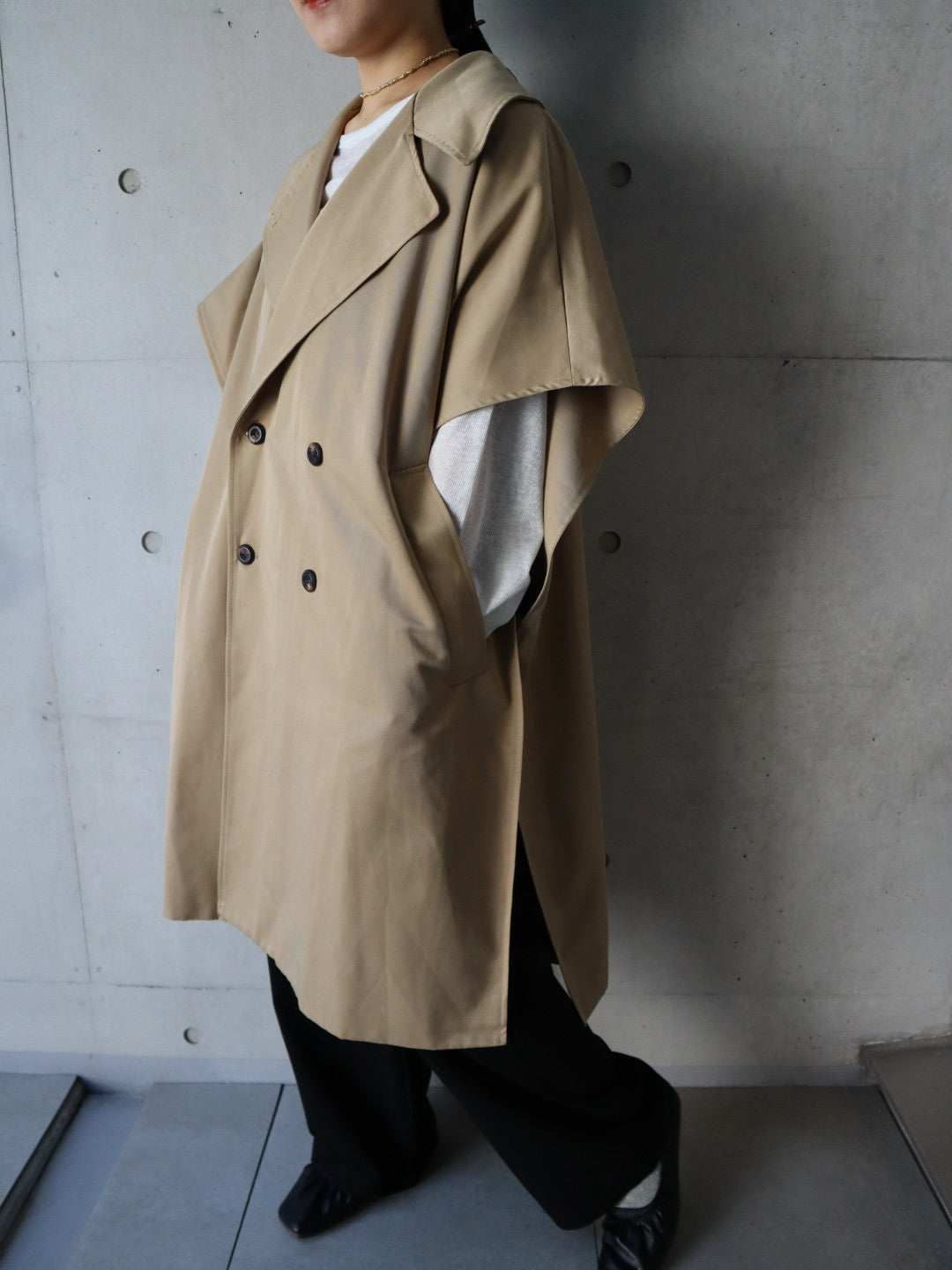 cape like trench coat