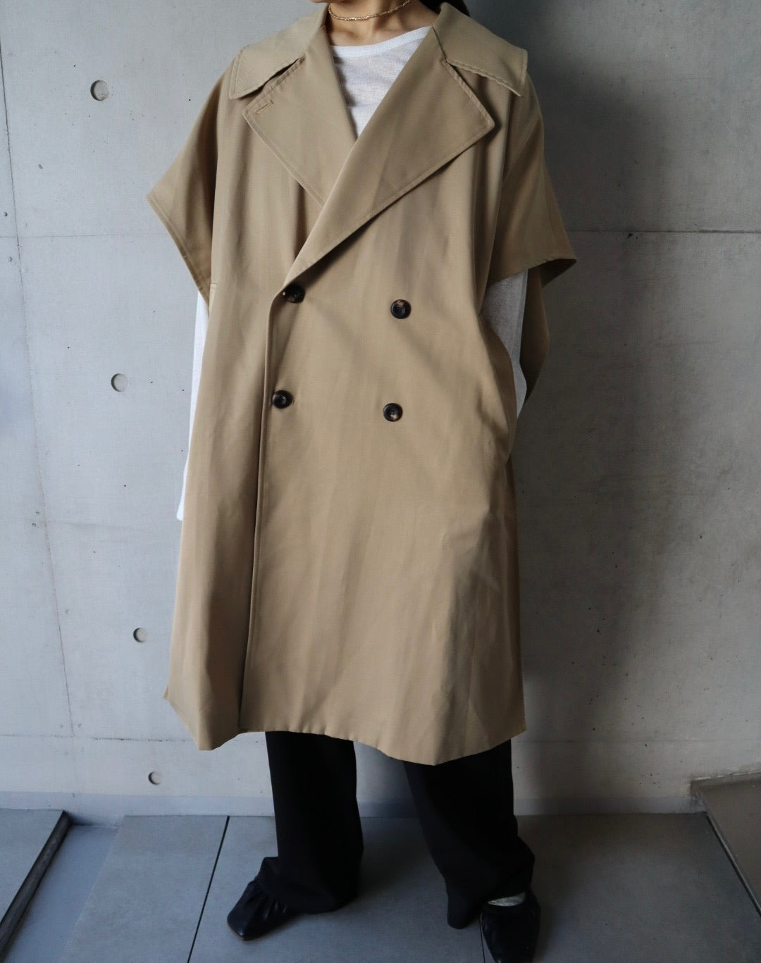 cape like trench coat