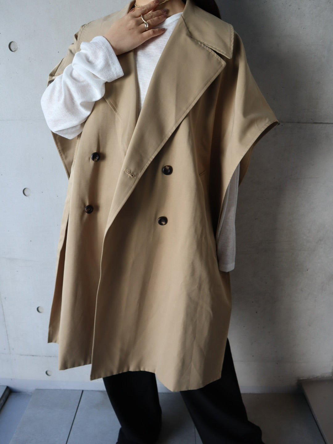 cape like trench coat